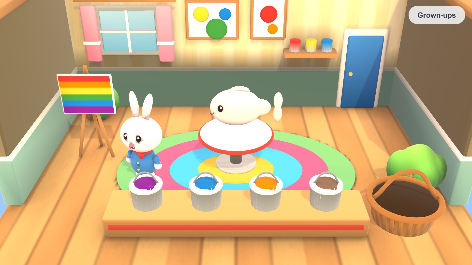 The Paint Shop: Rabbit beside a table of paint pots and a toy waiting to be painted.